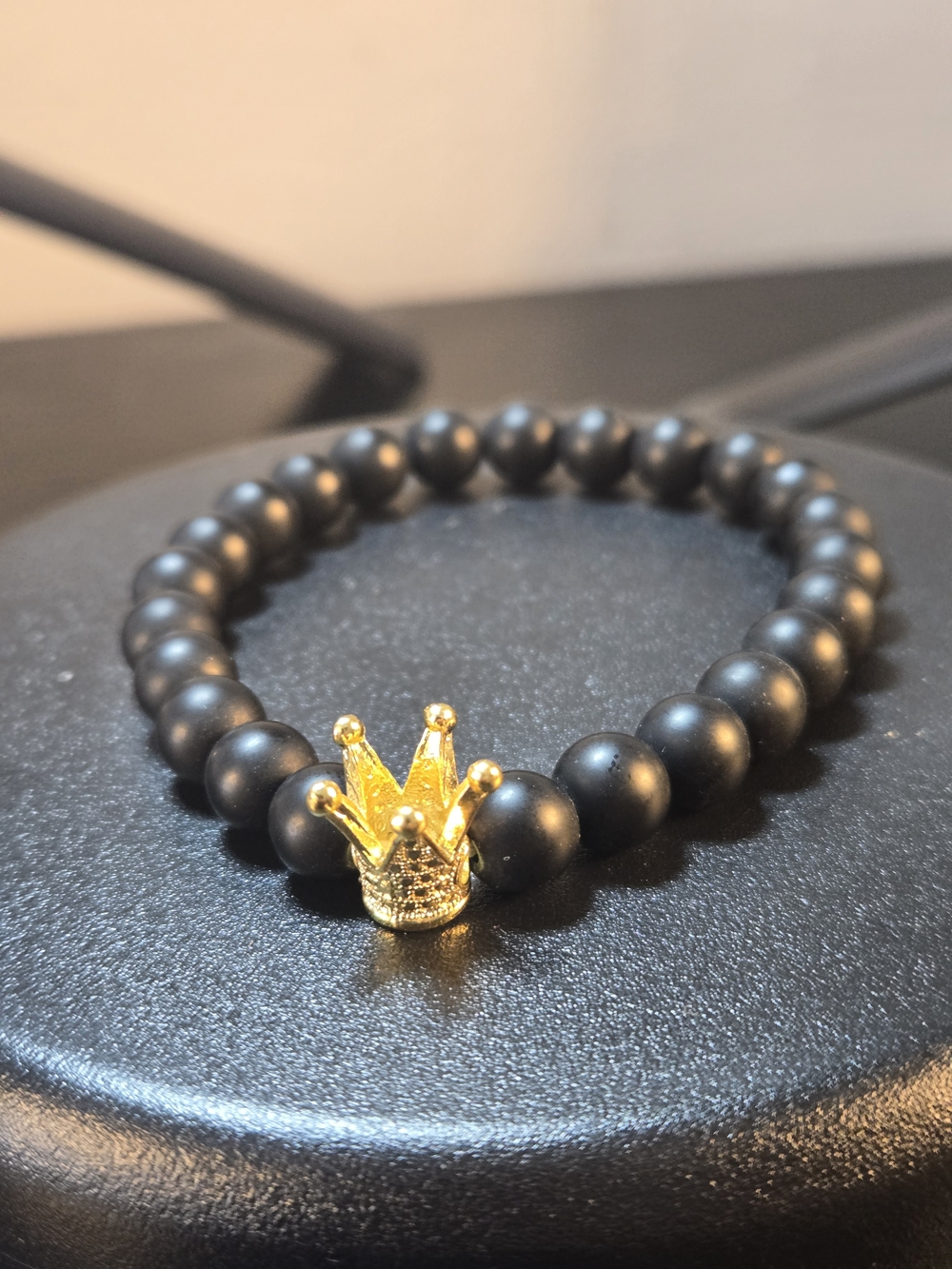 Men's Black Beaded Bracelet with Gold Crown Accent